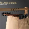 Solid wood ironwork clothes hanger, metal wide-shoulder seamless clothes hanger, home trouser rack, multi-functional light luxury ironwood clothes hanger details Picture
